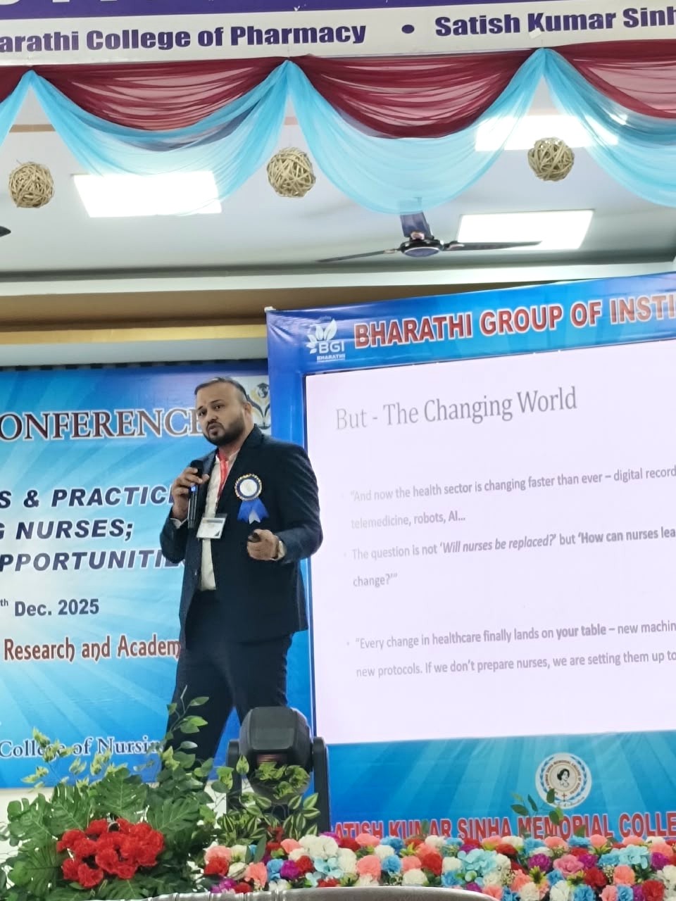 Dr. Ekansh Debuka delivering a talk at a nursing conference