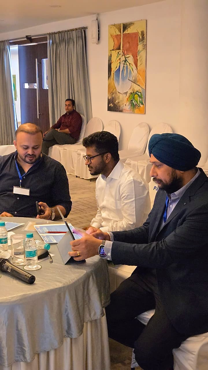 Dr. Ekansh Debuka participating in a professional conference discussion