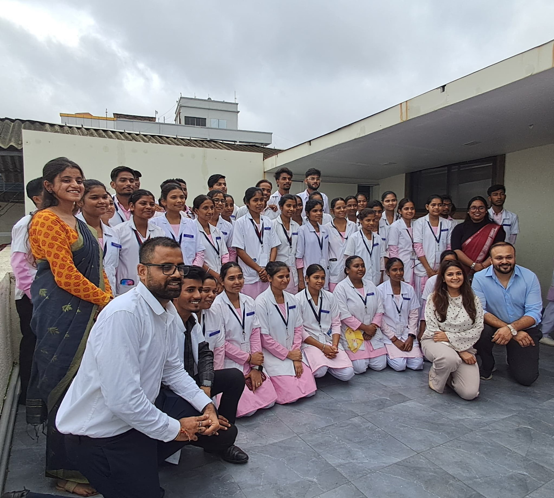 Nursing students and faculty gathered after a learning session