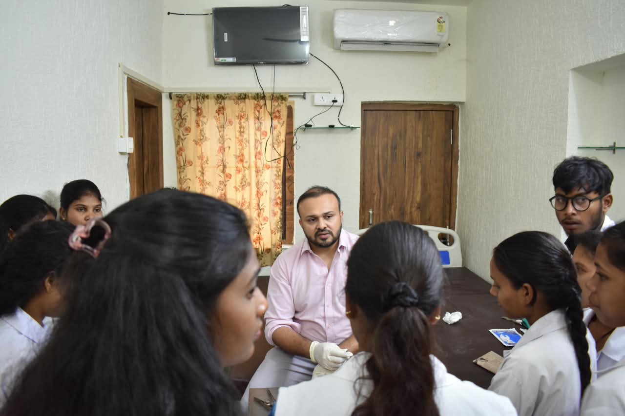 Dr. Ekansh Debuka leading a small-group clinical discussion