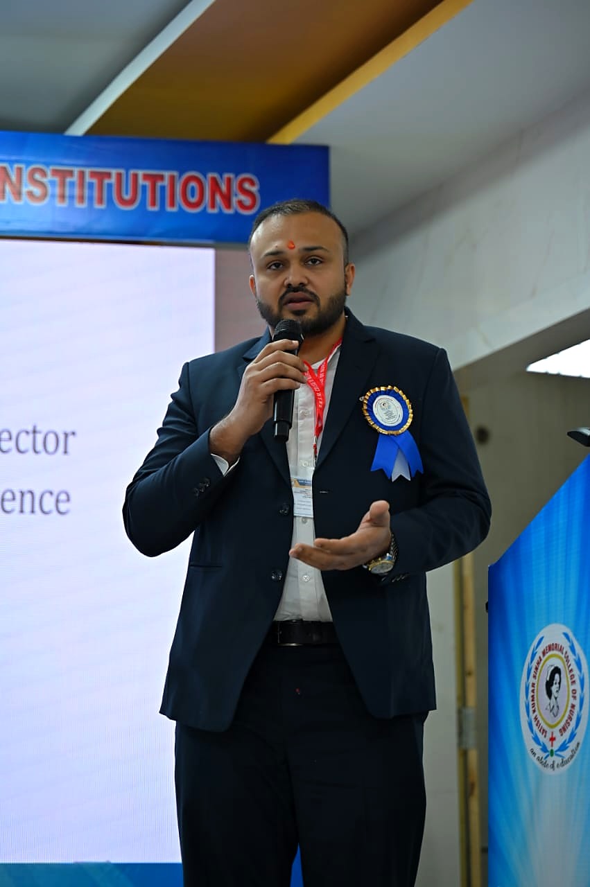 Dr. Ekansh Debuka speaking at a professional conference