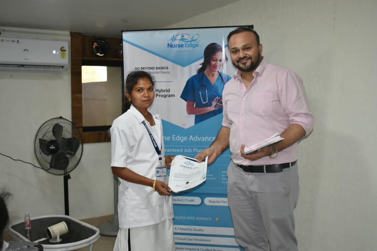 Dr. Ekansh Debuka presenting a Nurse Edge certificate to a participant